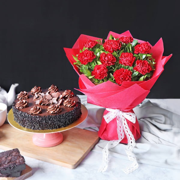 Order Bunch Of Red Carnations With Truffle Delight Cake online | Get ...