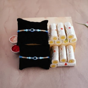 Two Eye Rakhi With Kaju Roll