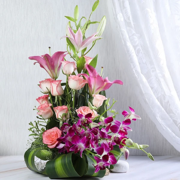 Lilies Orchids And Roses In Basket