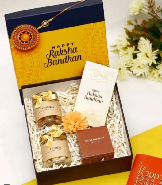 Premium Best Rakhi Delights Hamper – Elegant Rakhi, Salted Cashew Jar, Salted Almond Jar & Chocolate